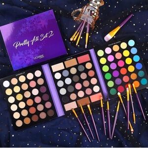 Complete makeup palettee eyeshadow bronzers contour blush highlight + brushes